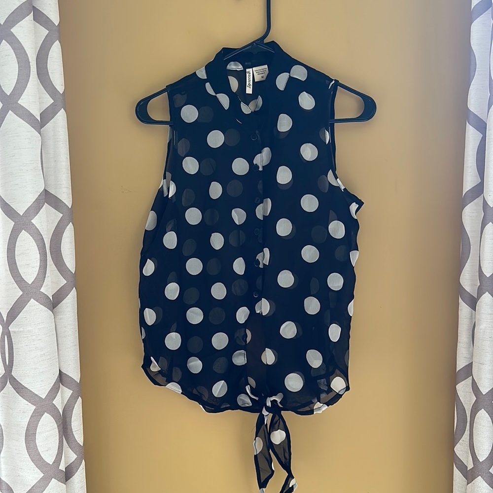 Tie slightly cropped black and white polkadot sheer top
